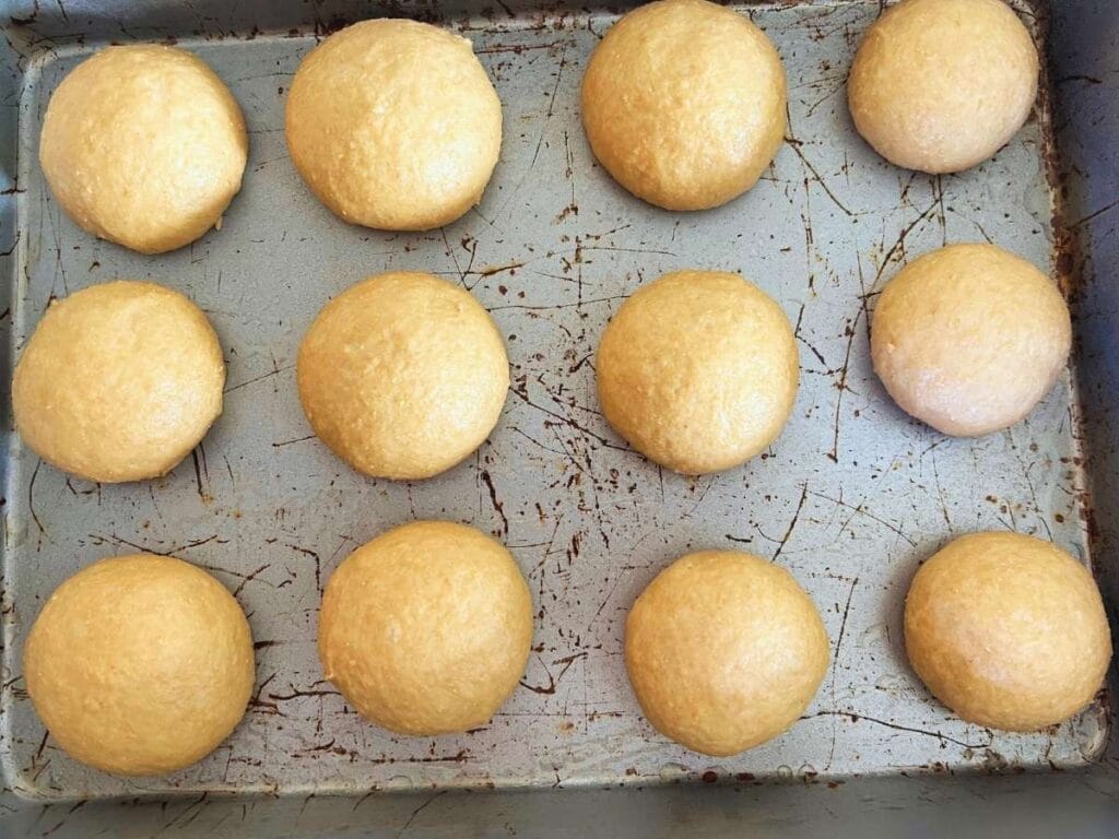 rolled whole wheat dough balls ready to rise