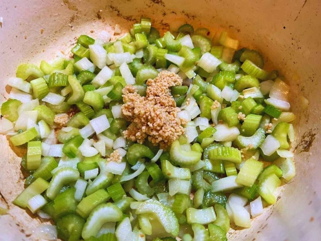 chopped celery onion and garlic in a pot