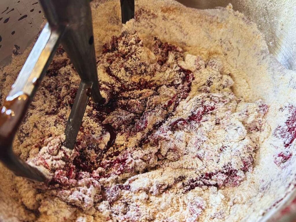 mixing flour into batter