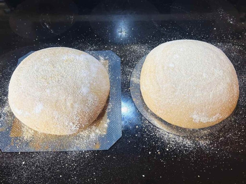 sourdough boules dusted with flour before baking