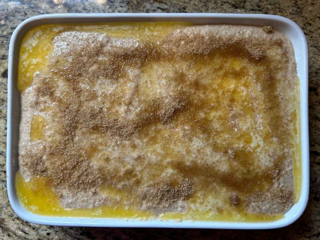 top view of dessert topped with melted butter and brown sugar